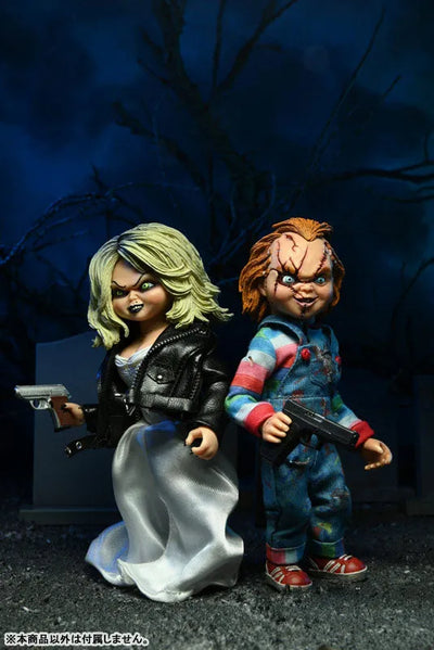 Child's Play Bride of Chucky / Chucky & Tiffany Action Doll 2PKㅤ – Neca – ActionFigureBrasil — ângulo diferente
